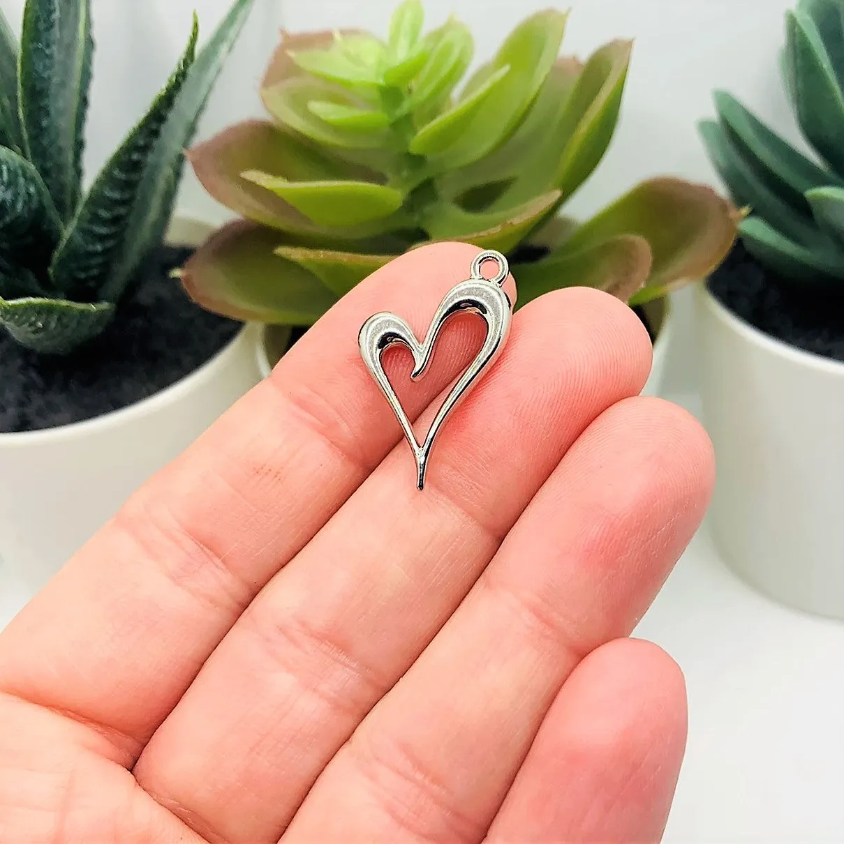 4 , 20 or 50 Pieces: Silver Asymmetrical Heart Charms